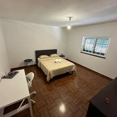 Quartos Em Alloggio in famiglia Arrentela